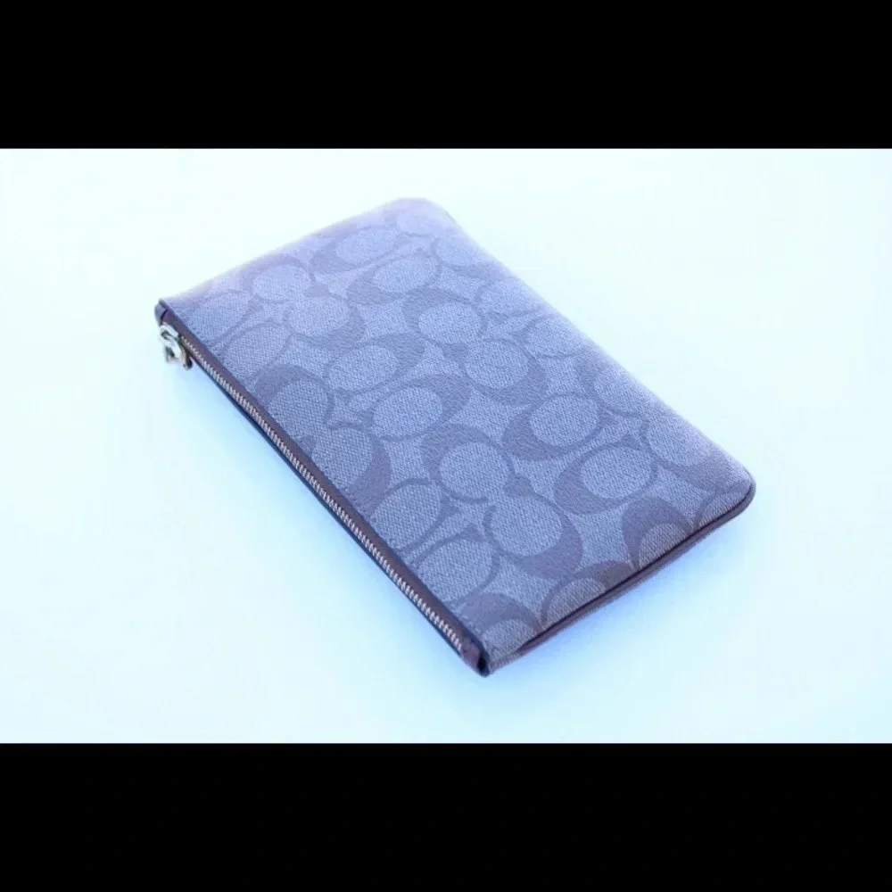 Coach signature logo cluth